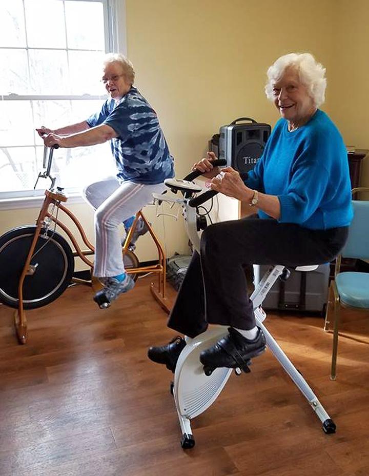 Residents enjoy some exercise on the stationary bikes