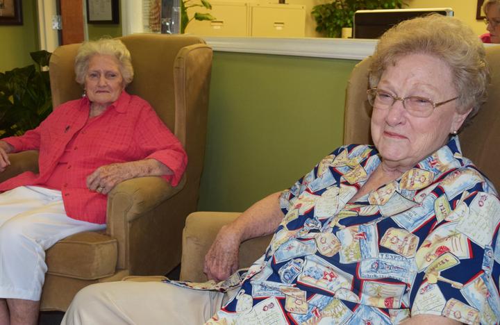 Two of our Assisting Living residents, who happen to be sisters, enjoy some time together