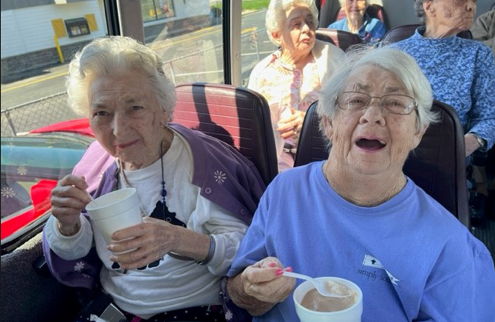 Residents enjoying ice cream and a day out with friends