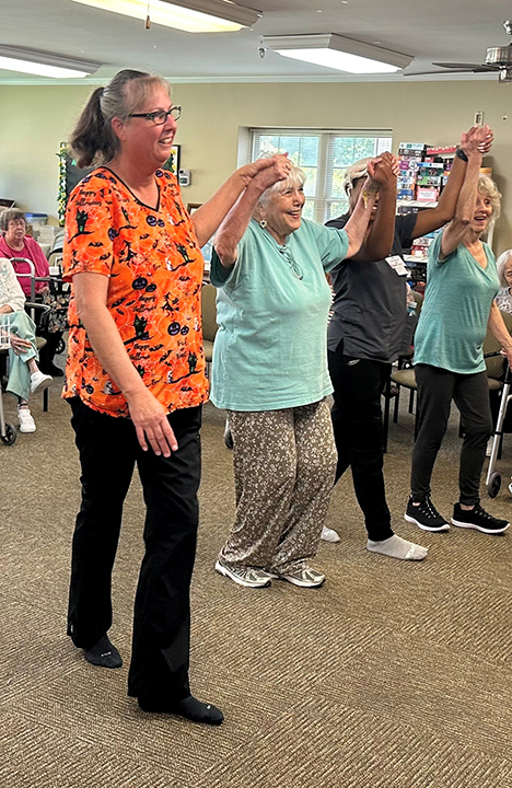 Assisted Living Residents enjoying some line dancing
